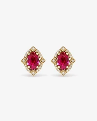 Oval Cut Created Ruby and Diamond Halo Stud Earrings in 10kt Yellow Gold