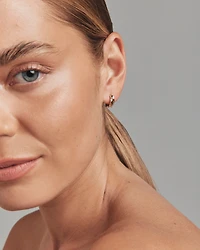10mm Twist Croissant Huggie Hoop Earrings in 10kt Yellow Gold