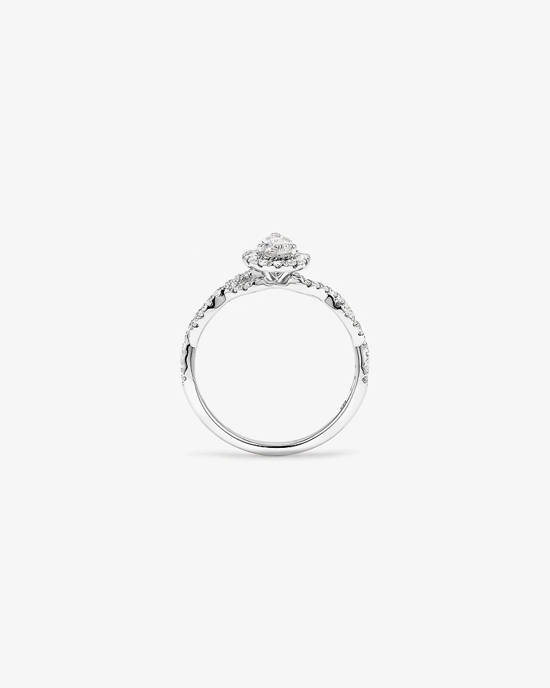 0.75 Carat TW Pear Cut Diamond Halo Twist Engagement Ring in 14kt White Gold