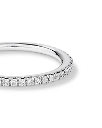 Alliance en or blanc 14 K avec diamants totalisant 0,20 ct