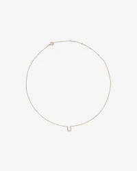 Collier à pendentif fer à cheval en or jaune 10 K avec diamants totalisant 0,10 ct