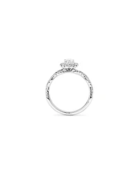 0.75 Carat TW Oval Cut Diamond Twist Side Accent Halo Engagement Ring in 14kt White Gold