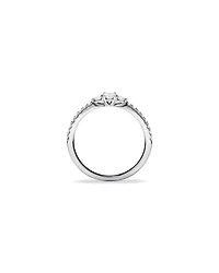 0.40 Carat TW Oval and Round Brilliant Three Stone Side Accent Engagement Ring in 14kt White Gold