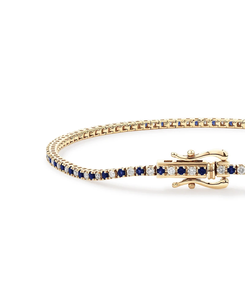 Bracelet tennis en or jaune 10 kt avec diamants de 0,68 carat TW et saphirs créés