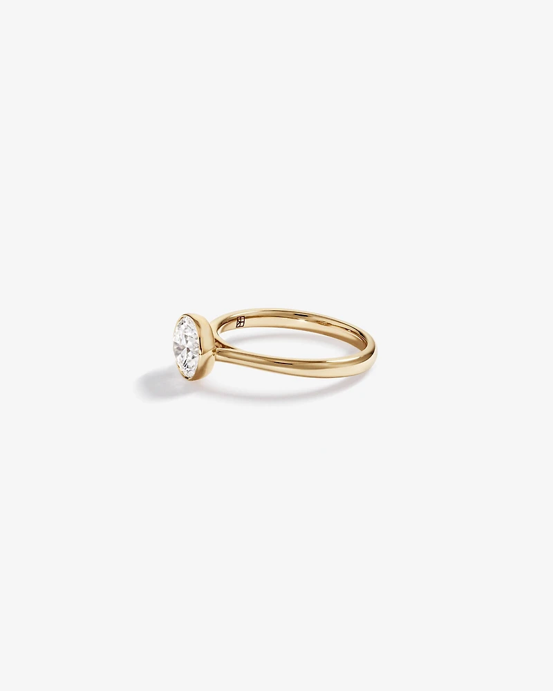 Bague de fiançailles solitaire sertie clos en diamant rond brillant de 1,25 carat TW, en or jaune 14 kt