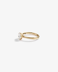 Bague de fiançailles solitaire sertie clos en diamant rond brillant de 1,25 carat TW, en or jaune 14 kt