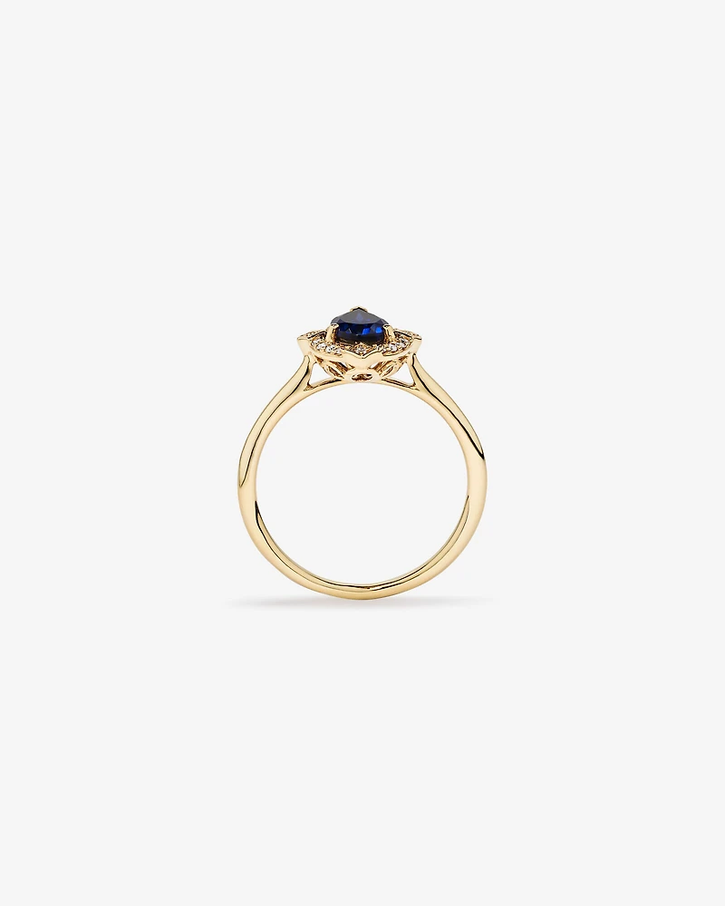 Pear Cut Created Sapphire and Diamond Halo Ring in 10kt Yellow Gold