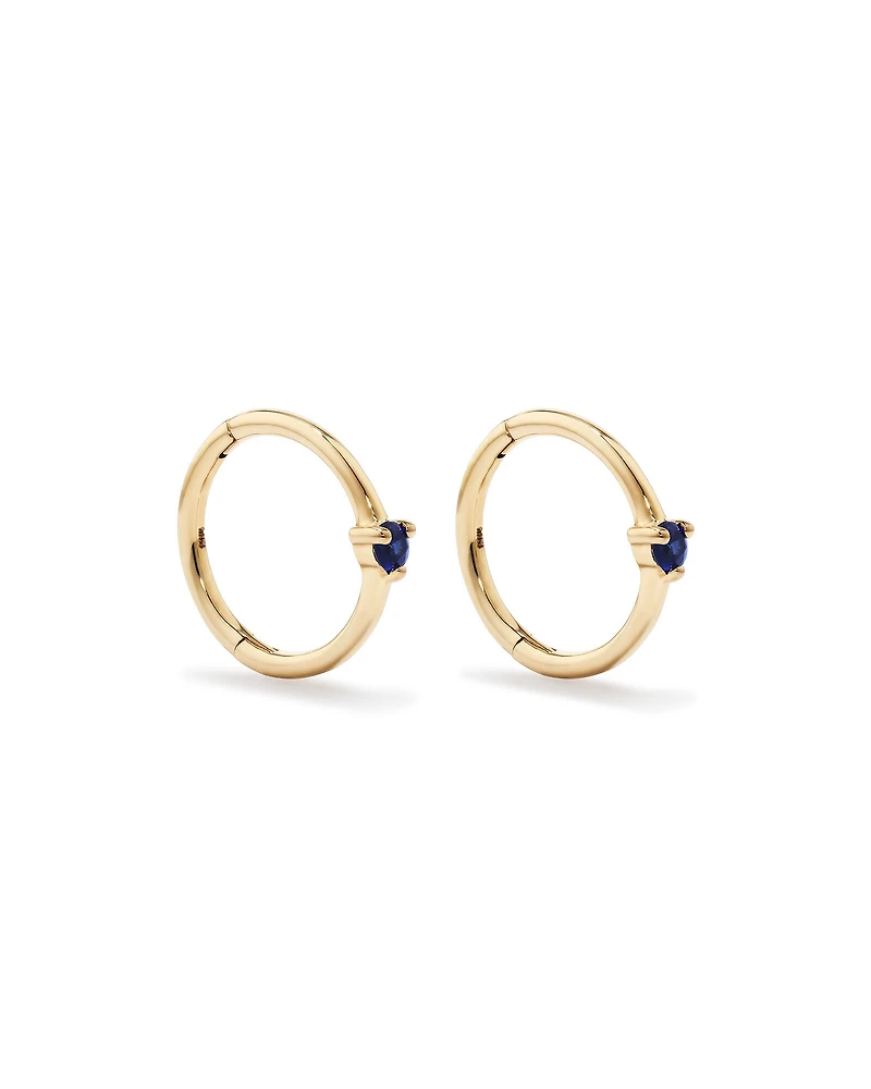 Boucles d'oreilles dormeuses avec accent de pierres précieuses saphir bleu en or jaune 10 carats