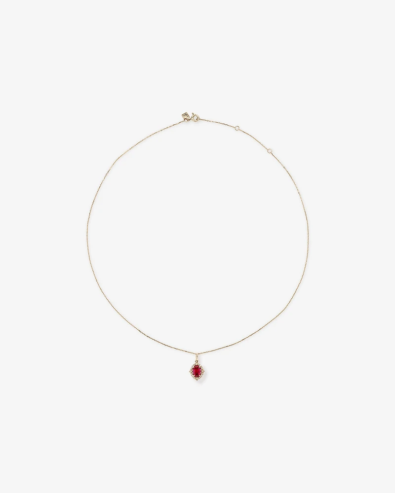 Oval Cut Created Ruby and Diamond Halo Pendant Necklace in 10kt Yellow Gold