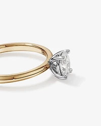 0.50 Carat TW Oval Canadian Diamond Solitaire in 18kt White Gold