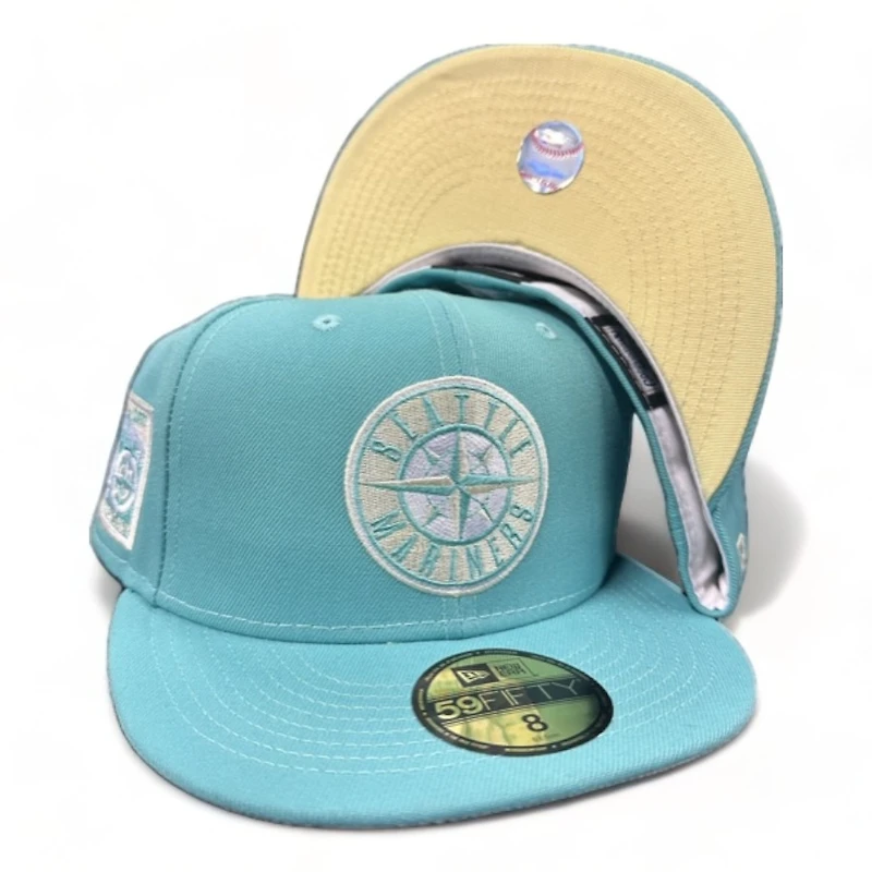 Seattle Mariners Teal Compass Logo 40th Anniversary Patch Pastel Yellow UV New Era 59FIFTY Fitted Hat