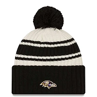 Baltimore Ravens New Era 2022 Cream NFL Sideline Sport Pom Cuffed Knit Beanie Hat