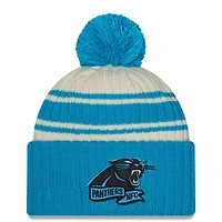 Carolina Panthers New Era 2022 Cream NFL Sideline Sport Pom Cuffed Knit Beanie Hat