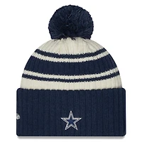 Dallas Cowboys New Era 2022 Cream NFL Sideline Sport Pom Cuffed Knit Beanie Hat