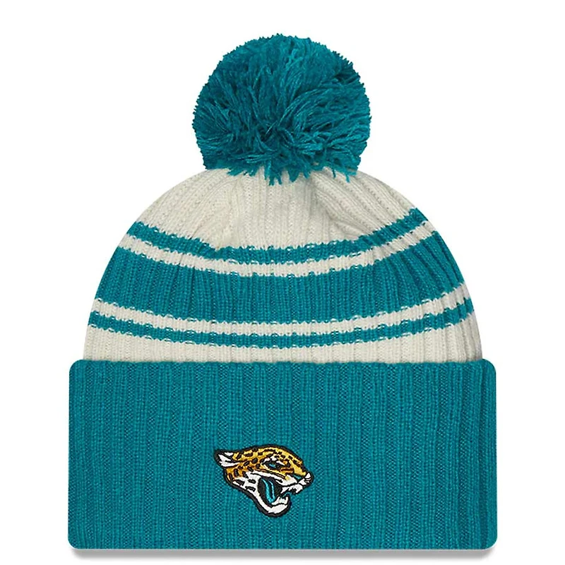 Jacksonville Jaguars New Era 2022 Cream NFL Sideline Sport Pom Cuffed Knit Beanie Hat