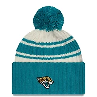 Jacksonville Jaguars New Era 2022 Cream NFL Sideline Sport Pom Cuffed Knit Beanie Hat