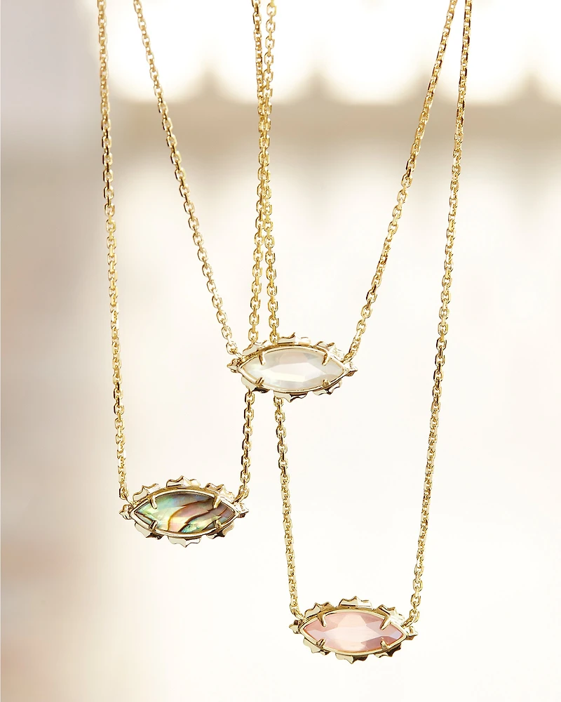 Genevieve Gold Short Pendant Necklace in Luster Plated Pink Cat's Eye Glass