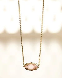 Genevieve Gold Short Pendant Necklace in Luster Plated Pink Cat's Eye Glass