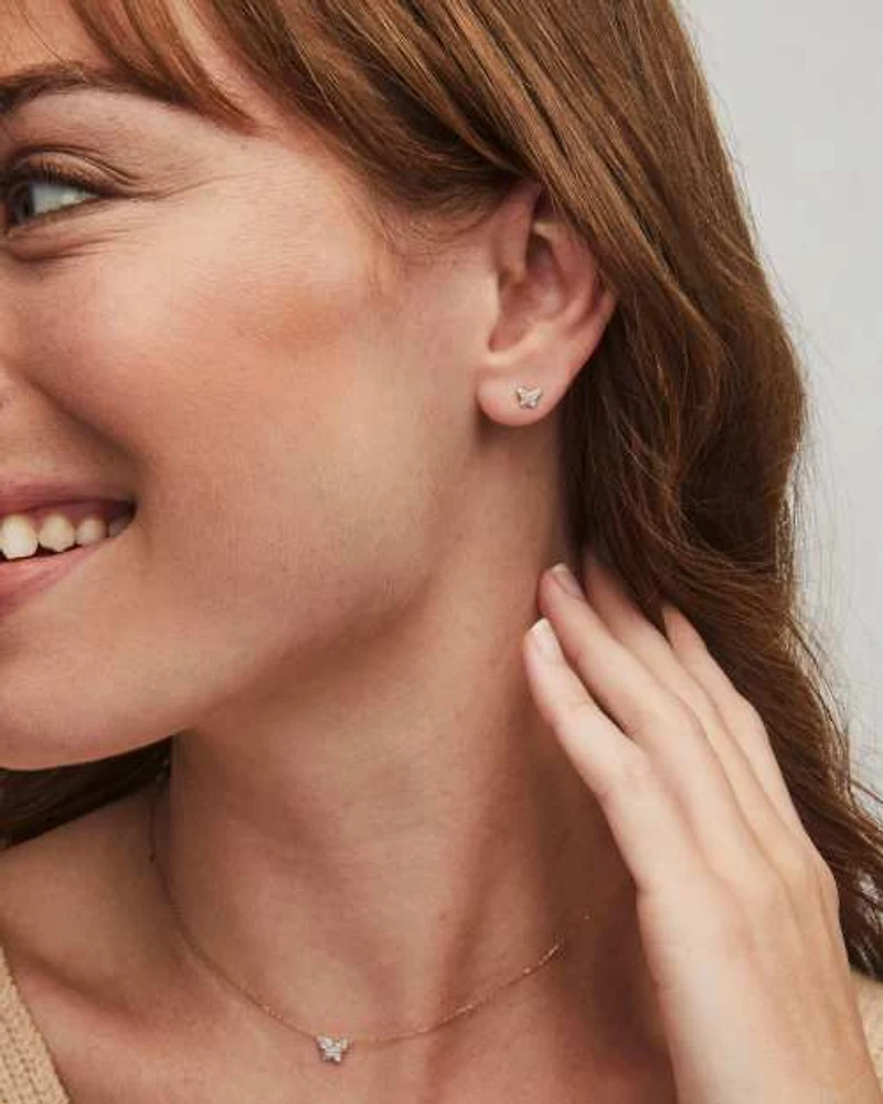 Butterfly 14k Yellow Gold Stud Earrings in White Diamond