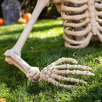 4 Ft. Posable Skeleton Grave Breaker™ Halloween Decoration