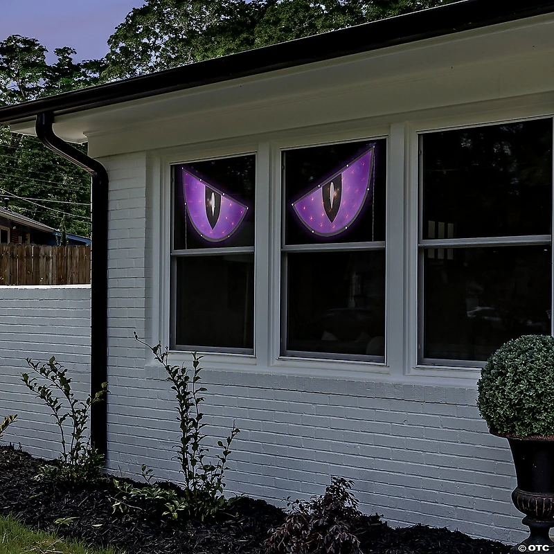 42" Lighted Purple and Black Eyes Halloween Window Silhouette Decoration