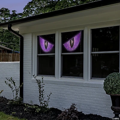 42" Lighted Purple and Black Eyes Halloween Window Silhouette Decoration