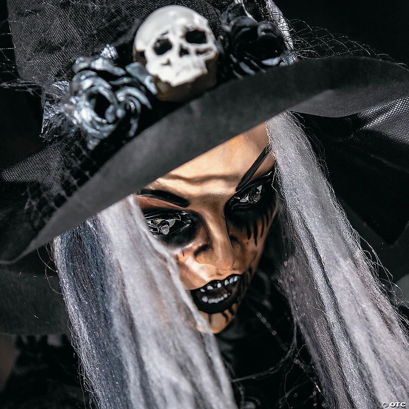 5 Ft. 6" Animated Standing Witch with Skull & Walking Stick
