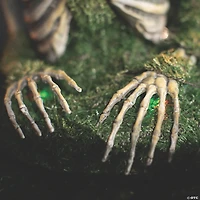 9 3/4" x 14 3/4" Animated Mossy Skeleton Tabletop Halloween Decoration