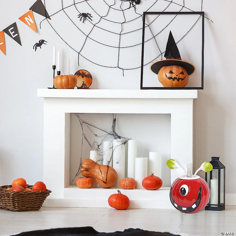 National Tree Company 11 in. Halloween Single Eye Metal Pumpkin Decoration