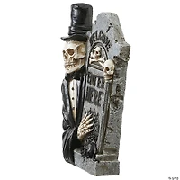 National Tree Company 12 in. Skeleton Holding Tombstone