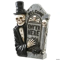 National Tree Company 12 in. Skeleton Holding Tombstone