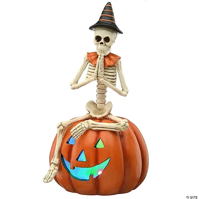 National Tree Company 12 in. Skeleton Sitting on Pumpkin