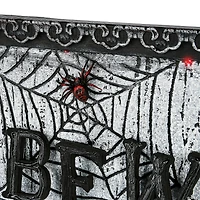 National Tree Company 18 in. Animated Halloween Door Sign, Sound Activated