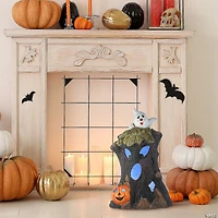National Tree Company 18 in. Haunted Tree Trunk with LED Light