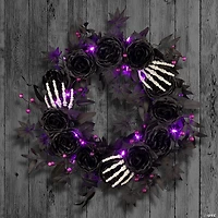 National Tree Company 24" Artificial Bad to the Bone Halloween Wreath, 30 Purple LED Lights, Battery Operated