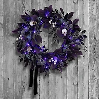National Tree Company 26" Artificial Floral Mini Skull Wreath, 30 Purple LED Lights, Battery Operated