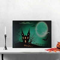 Northlight Green and Black LED Lighted Eerie Church in Cemetery Halloween Canvas Wall Art 23.5" x 15.5"