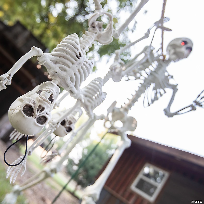 Small Skeletons Held Hostage By Large Skeletons Halloween Decorating Kit - 6 Pc.