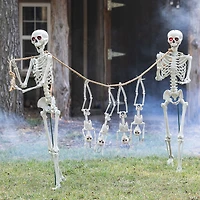 Small Skeletons Held Hostage By Large Skeletons Halloween Decorating Kit - 6 Pc.
