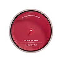 Santa On Skis Studio Candle