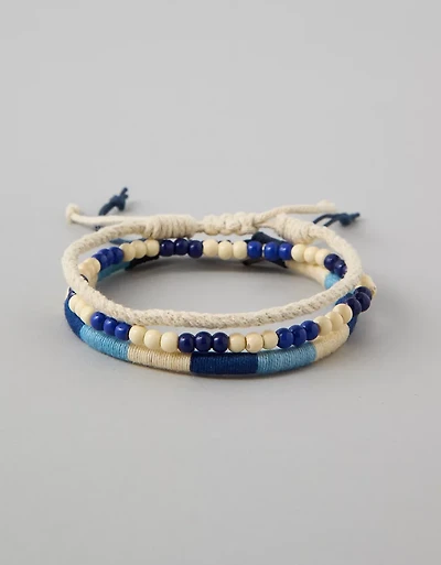 Emballage de trois bracelets tressés avec perles AE