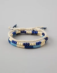 Emballage de trois bracelets tressés avec perles AE