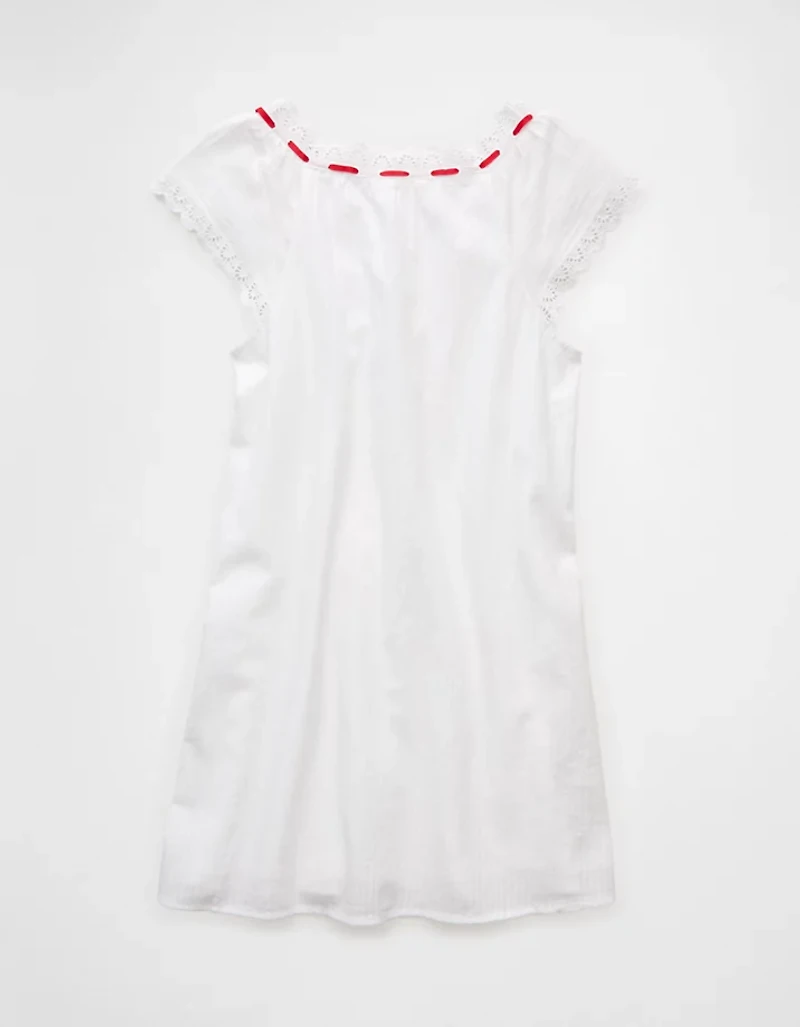 Minirobe boutonnée avec encolure en V et volants AE