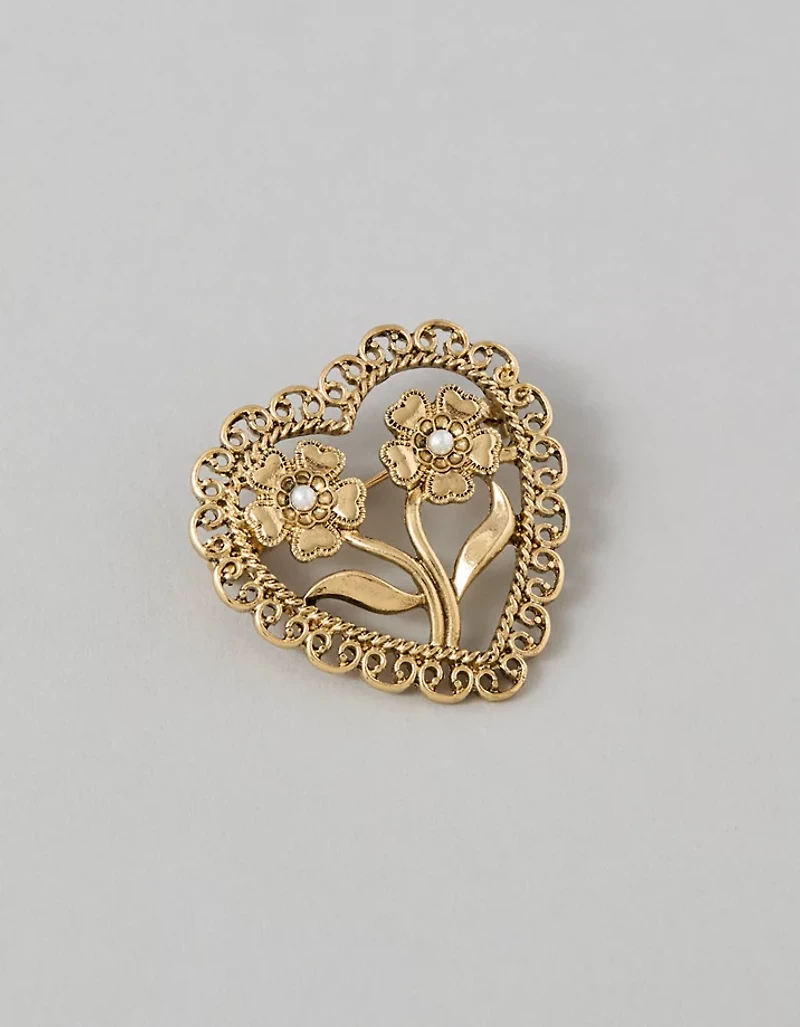 Broche de ton doré avec cœur AEO