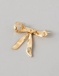 Broche en forme de nœud en boucle AEO