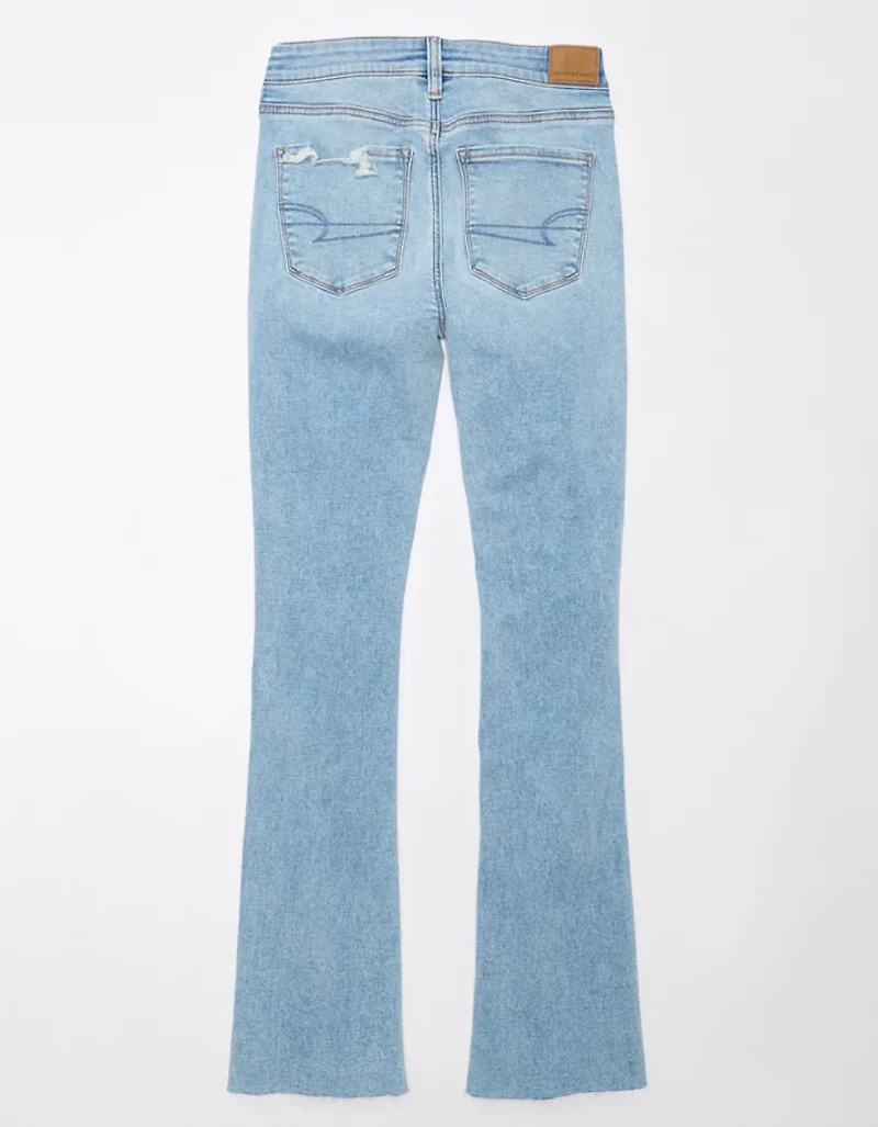 Jean seconde peau à jambe légèrement évasée déchiré et taille haute Next Level AE