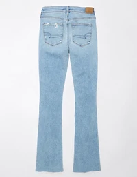 Jean seconde peau à jambe légèrement évasée déchiré et taille haute Next Level AE