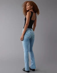 Jean seconde peau à jambe légèrement évasée déchiré et taille haute Next Level AE
