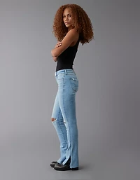 Jean seconde peau à jambe légèrement évasée déchiré et taille haute Next Level AE