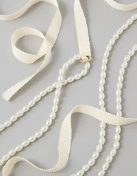 Collier perlé noué à l’arrière AE